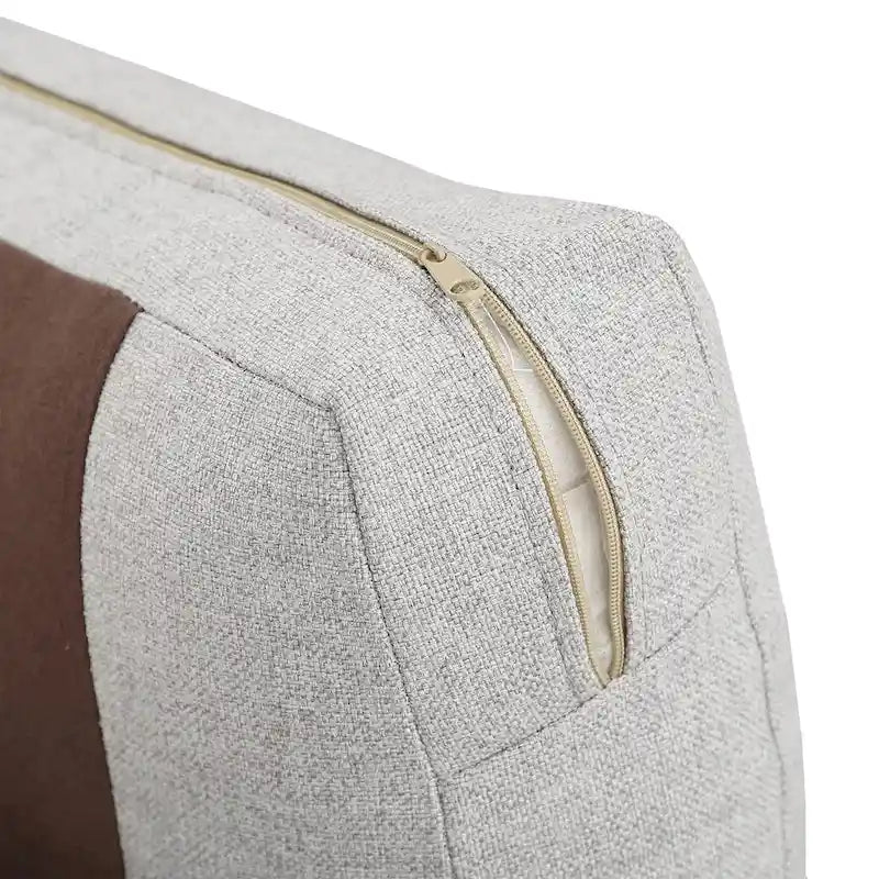 Divano in tessuto grigio con gambe in metallo dorato