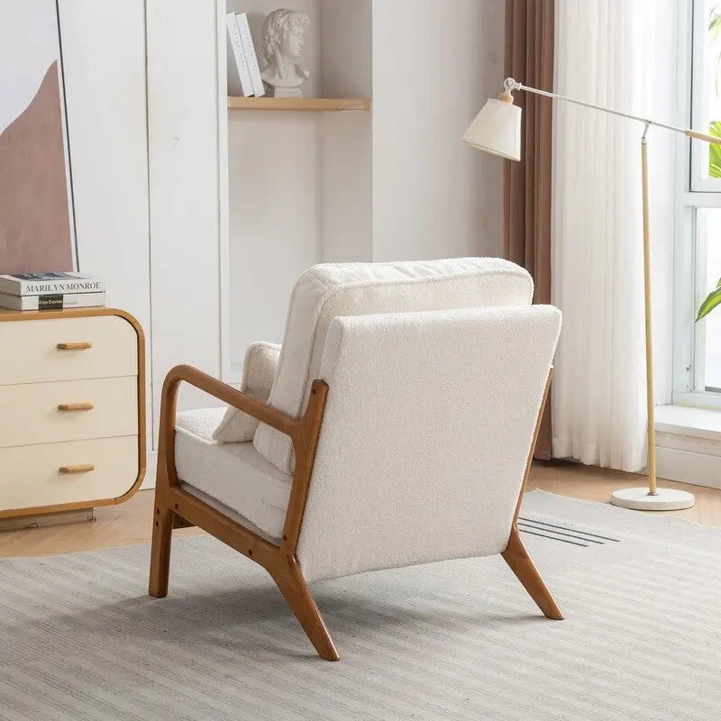 Poltrona decorativa in stile metà secolo in legno massello con rivestimento bouclé e cuscino