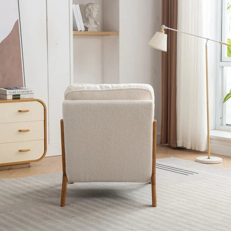 Poltrona decorativa in stile metà secolo in legno massello con rivestimento bouclé e cuscino